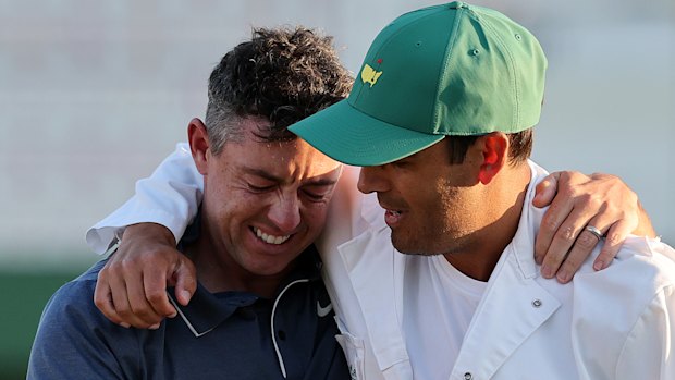 McIlroy, with caddie Harry Diamond, is overcome with emotion.