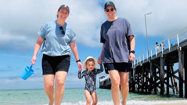 Lauren Arnell and her wife Lexie Edwards with their daughter Marlie.