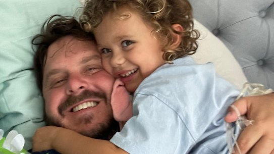 Liberal MP Phil Thompson and his daughter Emery, who has been assisted by NDIS early intervention support.