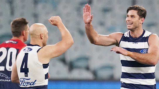 Top Cat: Geelong forward Tom Hawkins celebrates a major during the round 4 win over Melbourne at the MCG.