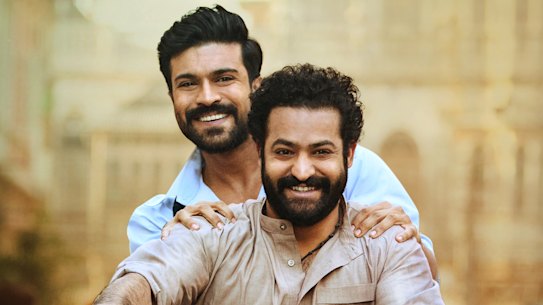 Ram Charan, rear, as Rama Raju and N.T. Rama Rao Jr as Komaram Bheem in the blockbuster RRR.