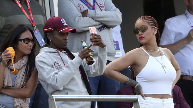High-profile support: Singer Rihanna watches in the stands. 