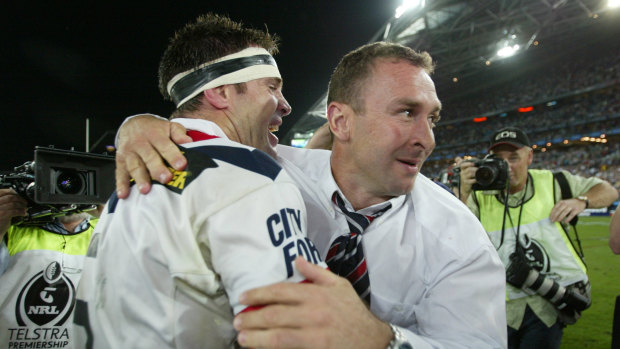Ricky Stuart and Brad Fittler celebrate premiership success in 2002.