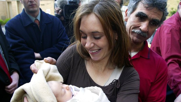 Anita Barbaro reunited with her baby, Montana Barbaro at the Royal Childrens  Hospital as her father, Nick Ciancio, looks on in August 2004.