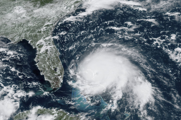 A satellite image shows Hurricane Dorian churning over the Atlantic Ocean on Sunday.