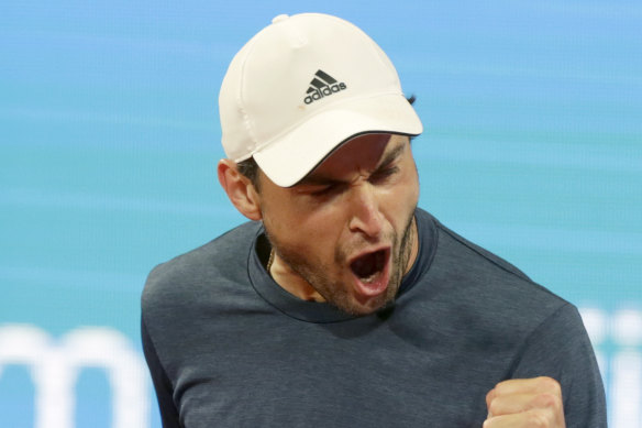 Aslan Karatsev celebrates en route to his win over Novak Djokovic.