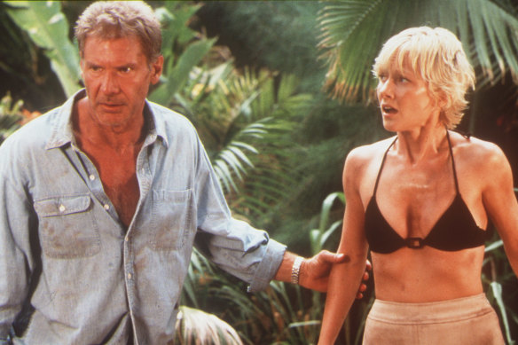 Heche in the 1998 romcom Six Days, Seven Nights, with co-star Harrison Ford.