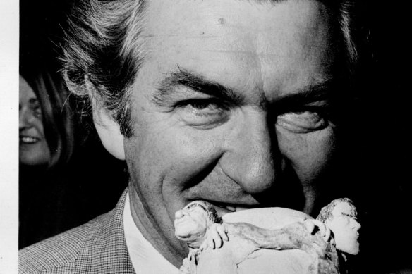 Bob Hawke hoists a cold one.