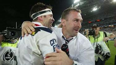 Ricky Stuart and Brad Fittler celebrate premiership success in 2002.