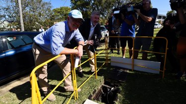 Treasurer Scott Morrison and Communications Minister Mitch Fifield watch the NBN being connected in Miranda in NSW. 