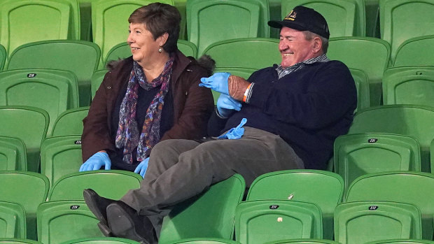 Having a ball: The parents of Storm debutant Chris Lewis report for duty.