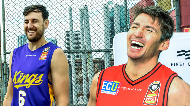 Serious stuff starts soon: Bogut jests with Perth Wildcats point guard Damian Martin.