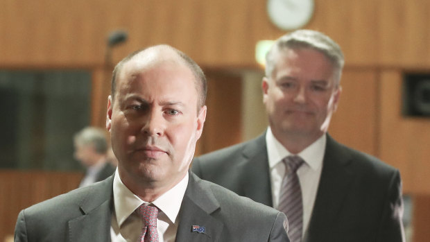 Treasurer Josh Frydenberg (left) and Finance Minister Mathias Cormann will deliver the largest deficit on record next week, but economists say they should not scrimp on spending.