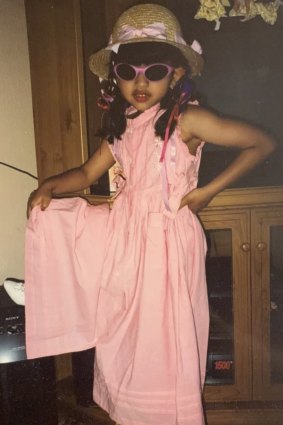 Thattil enjoyed dressing up for pretend photo shoots as a little girl.