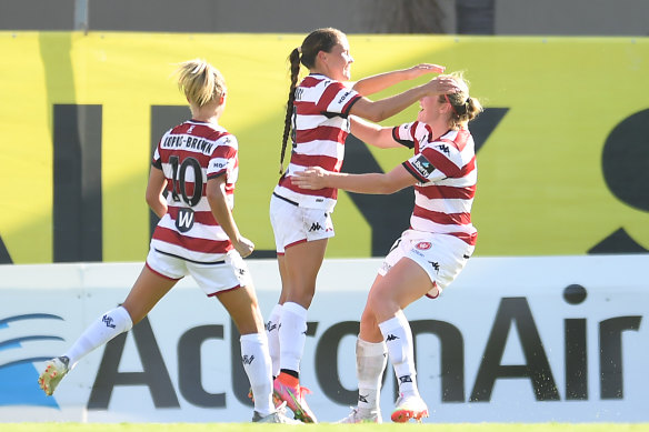 Bryleeh Henry celebrates her penalty for the Wanderers.