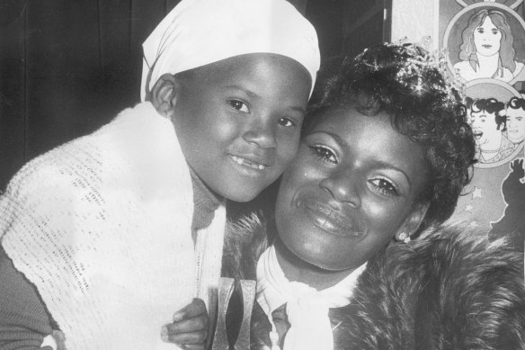 Marcia Hines with daughter Deni in 1976 after being awarded Queen of Pop.