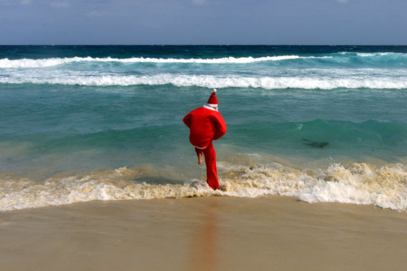 Santa cools off at Bondi.