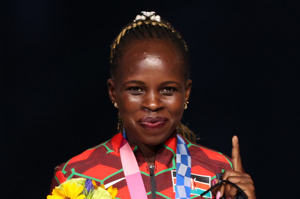 Gold medallist Peres Jepchirchir of Kenya at the medal ceremony during the closing of the Tokyo Games.