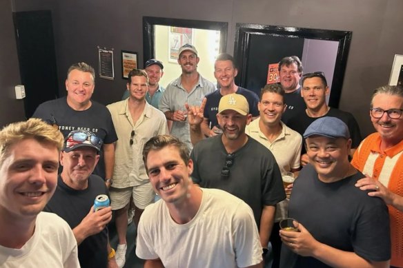 Current Australian players Pat Cummins, Steve Smith and Nathan Lyon pose with Six and Out members in Adelaide.