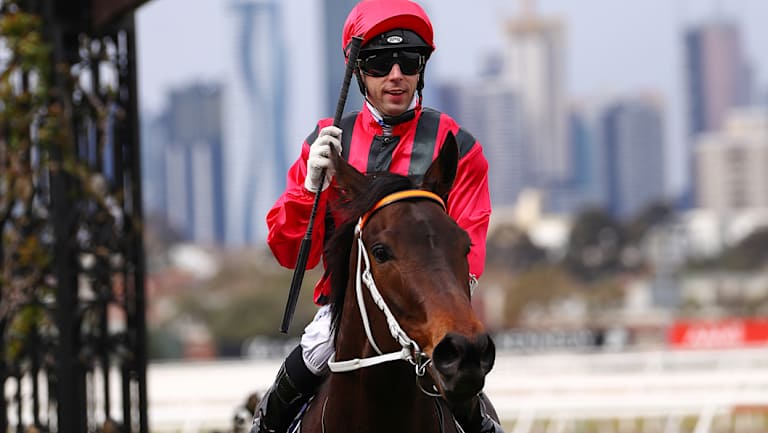 Correct weight; Jockey Brenton Avdulla returns to the scale after riding Smart Melody to victory in race 2, the Cap D'Antibes Stakes at Flemington Racecourse on Saturday.