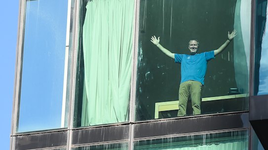 Quarantine guest Patrick Enright celebrates 'leaving day' after two weeks in a quarantine hotel.
Patrick celebrates his release day from his room.