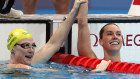 Emma McKeon, right, and Cate Campbell celebrate their 100m freestyle performances on Friday.