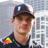 

Max Verstappen (left) and fellow  Red Bull driver Liam Lawson with the Oracle Red Bull Racing RB21 ahead of the Australian Grand Prix.