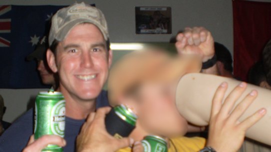 SAS soldier Ben Roberts-Smith carousing with US soldiers and a prosthetic leg taken from an Afghan man whom he killed. The leg was used as a beer drinking vessel at the SAS base in Afghanistan and was known as "Das Boot".
