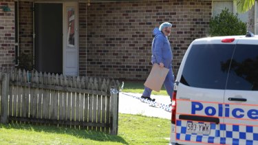 Police at the Ulinga Crescent crime scene in Parkinson on Friday afternoon.