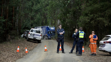Police on Thursday at a command centre at Blair’s Hut, about eight kilometres from the crash site.