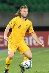 “All good memories, a few ordinary haircuts.” Rhyan Grant in action for the Socceroos.