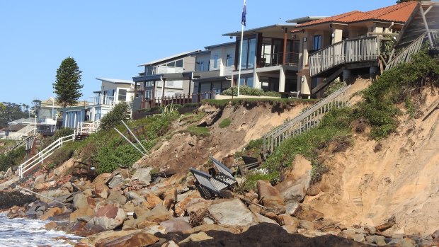 Storm-damaged sand dunes and beachfront houses at Wamberal.