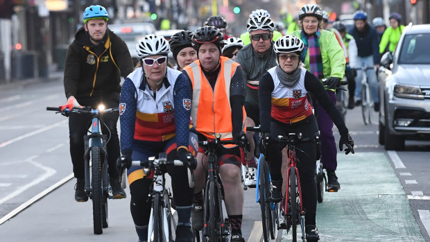 Melbourne cyclists ride down Chapel Street to remember Gitta Scheenhouwer. 