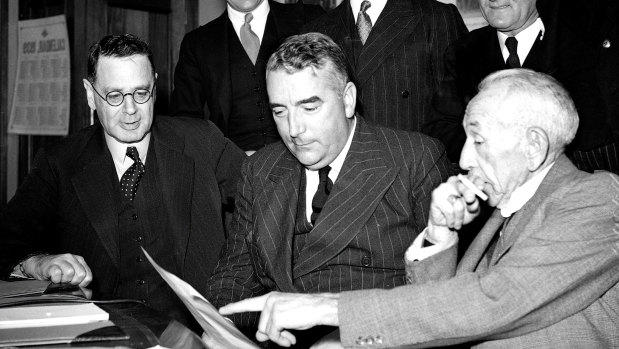 Robert Menzies and his cabinet after being sworn in by the Governor General at Parliament House in Canberra on 26 April 1939.  At right is Attorney-General and ex-Prime Minister Billy Hughes.