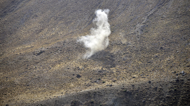 Smoke rises during a live firing exercise, in Panjshir province, northeastern Afghanistan.