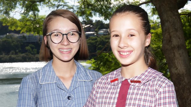 Grace Bricknell (left) and little sister Lily are going to different high schools.