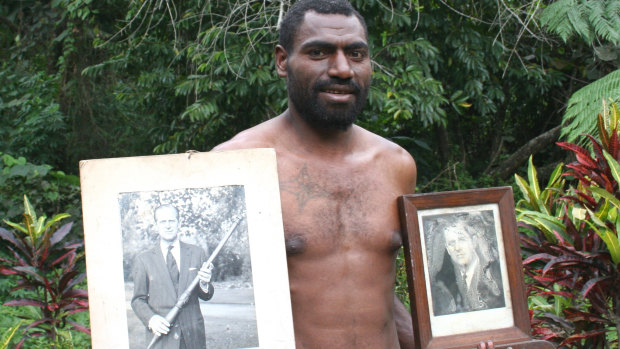  Tanna island resident Nathuan with photos of Prince Philip.