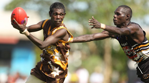 Action from the 2013 grand final between the Imau Tigers and Tapalinga Superstars on Bathurst Island, north of Darwin.