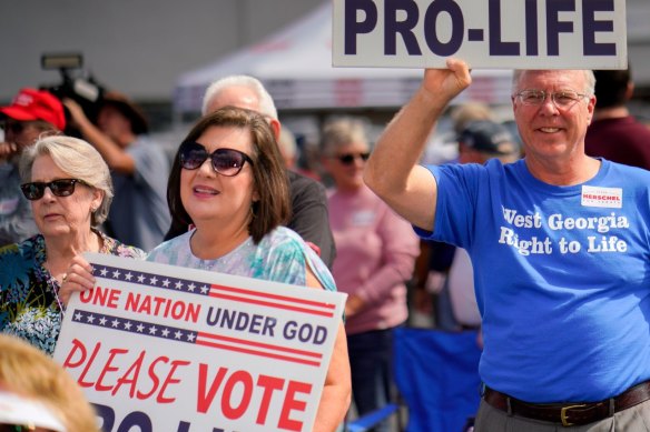 Republican voters at a campaign rally in Georgia for Trump-backed candidate Herschel Walker.