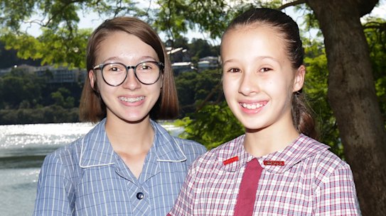 Grace Bricknell (left) and little sister Lily are going to different high schools.