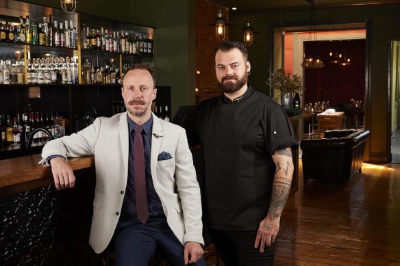 Ambergris Hotel owner and sommelier David Ellis (left) with chef Jackson Wilde.
