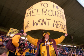 Looking back: A Hawthorn fan makes his displeasure known in the 1990s.