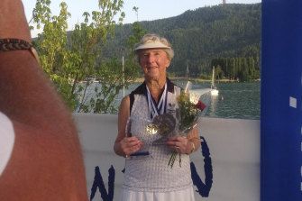 Shirley Whitaker holds her two senior champion trophies in Austria.