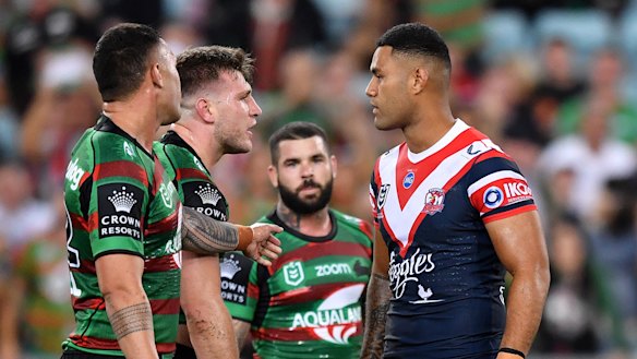 Jai Arrow greets Roosters rookie Daniel Suluka-Fifita after the Rooster was sent to the sin bin.