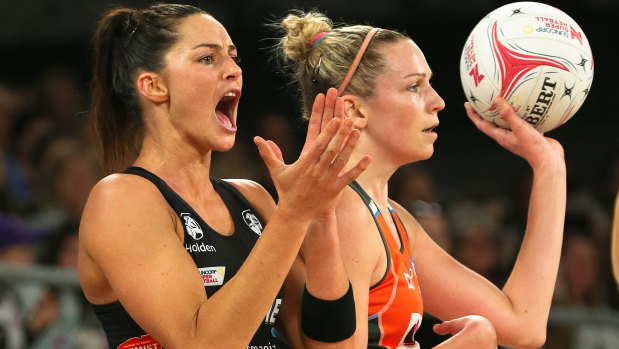 In full voice: Sharni Layton with Jo Harten of the Giants during her last match for the Magpies.