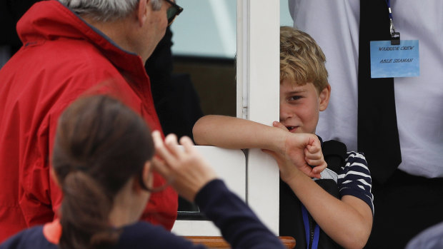 Prince George appeared a little more shy than his sister.