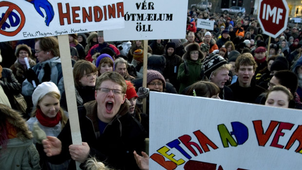 Demonstrators crowd into a city square in Reykjavik, Iceland in 2008, during a protest spurred by the country's economic collapse.