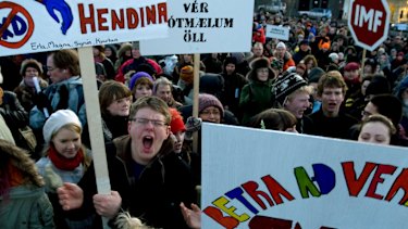 Demonstrators crowd into a city square in Reykjavik, Iceland in 2008, during a protest spurred by the country's economic collapse.