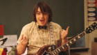 Jack Black in a scene from the movie School of Rock, which the musical is based on.