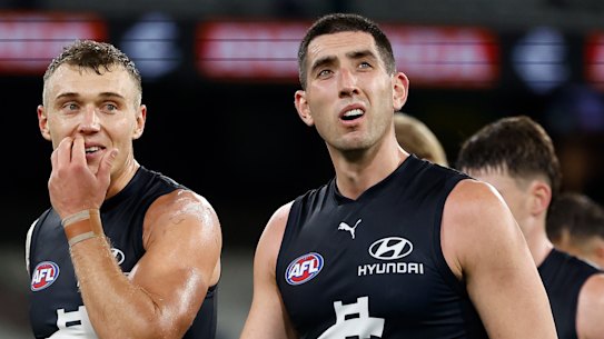 Should Patrick Cripps (left) hand over the captaincy to Jacob Weitering at season’s end?